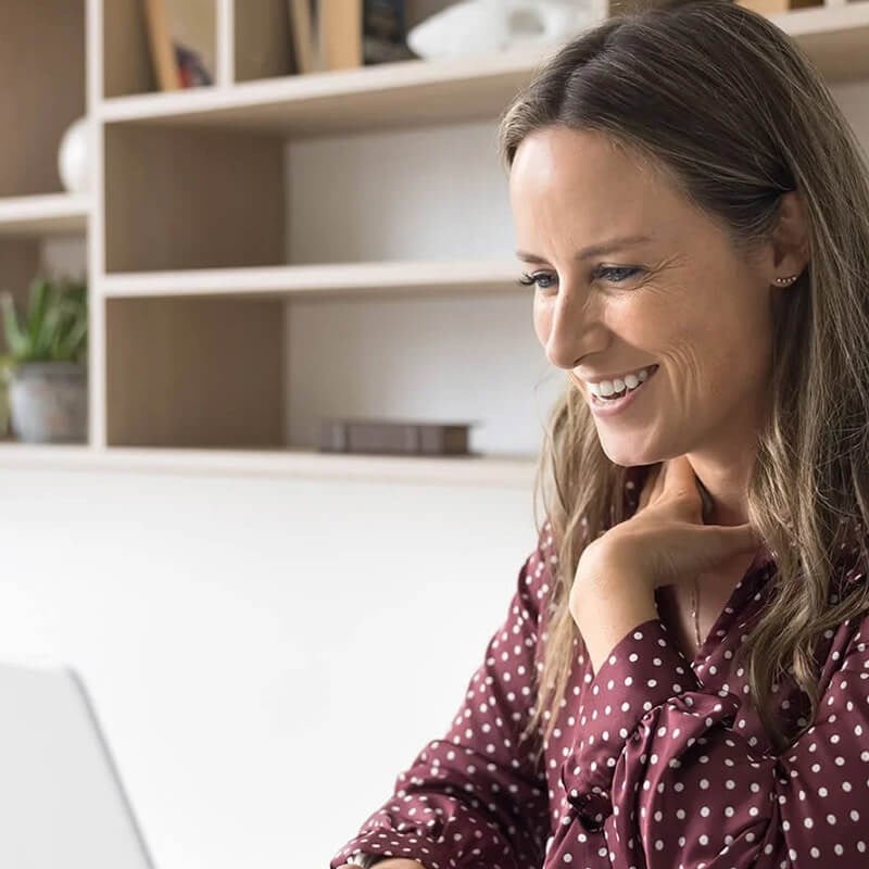 Woman Researching On Laptop